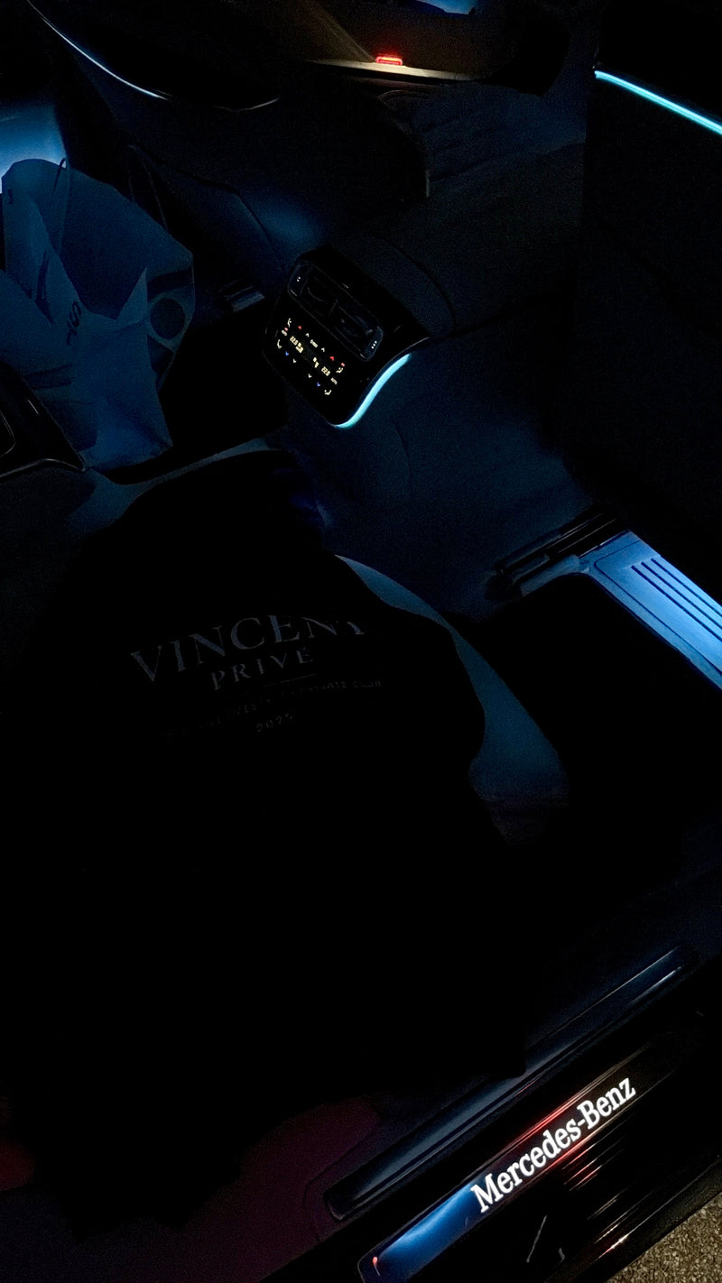 Close-up of a Mercedes-Benz car interior with 'Vincent Private' branding.